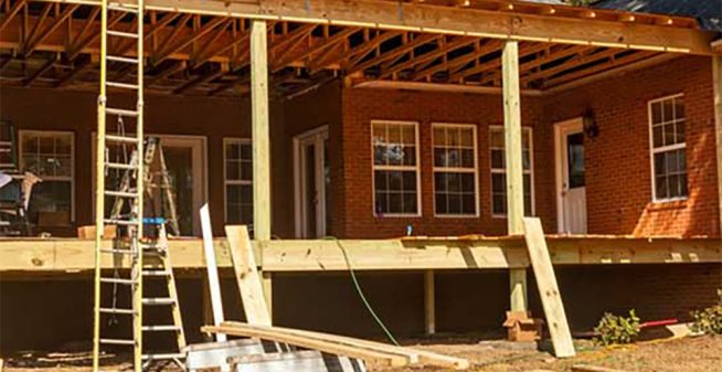 New roof! Men installing a new roof on a house.